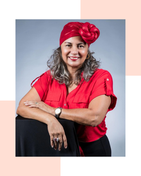 Sandra Cline, the founder of Quantum Mystic Academy, wearing a red shirt and a matching red headwrap, welcoming visitors to her 16-minute free audio experience.